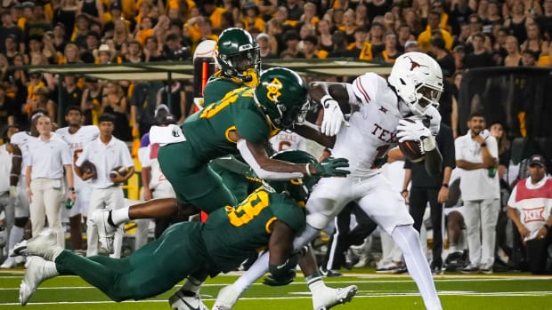 Texas wide receiver Xavier Worthy (1) carries the ball into the end zone to score in the third quarter of the Longhorns' game against the Baylor, Saturday, Sept. 23 at McLane Stadium in Waco. Texas won the game 38-6.